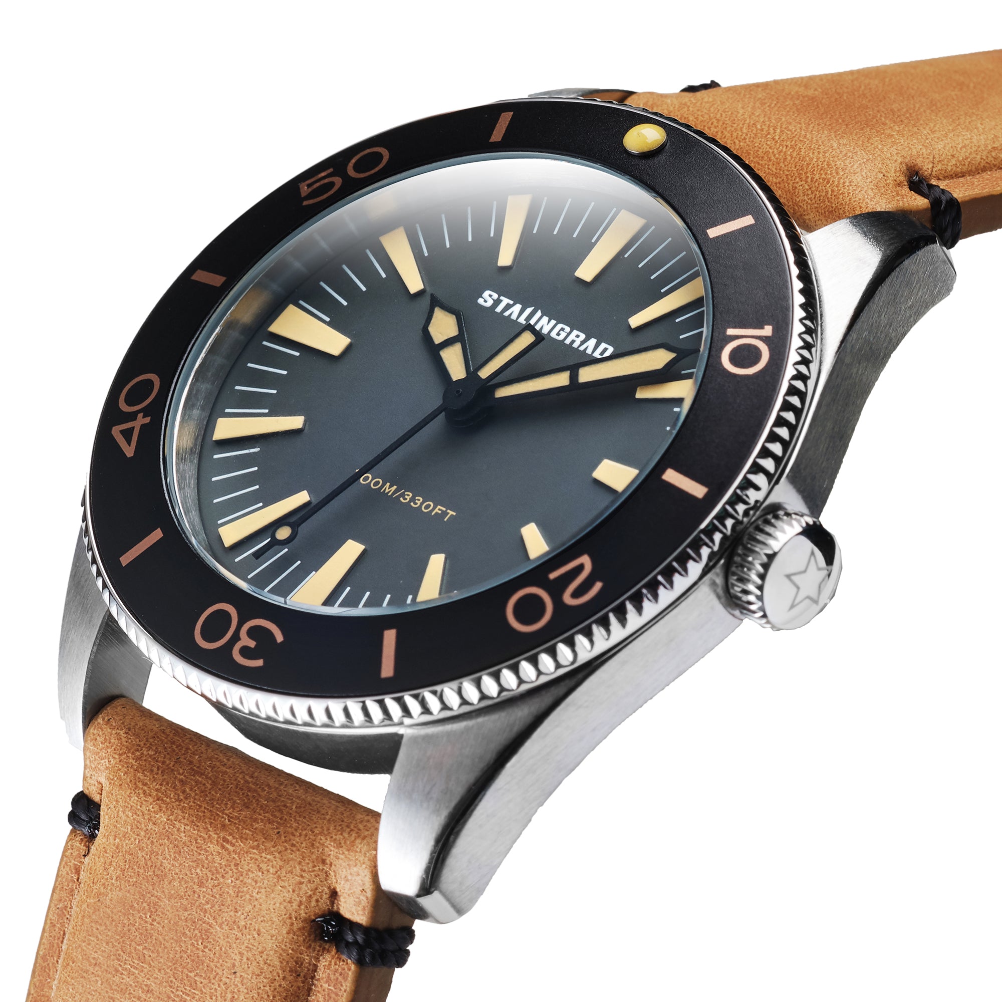 Stalingrad Iron Will Watch Grey Dial, with Black Bezel and a tan leather strap on a white background, diagonal view