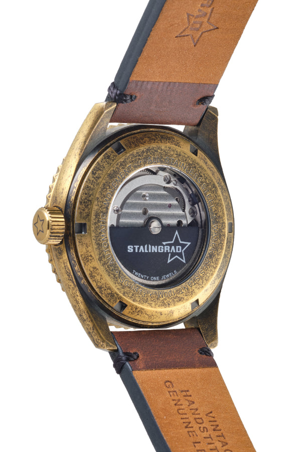 Stalingrad Volga defender automatic watch brass case, display case back on a white background